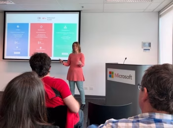 Selena Woodward speaking at Microsoft — an example of how to get speaking gigs as an entrepreneur.
